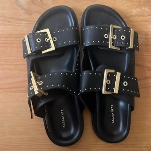 Black with brass details, All Saints sandals